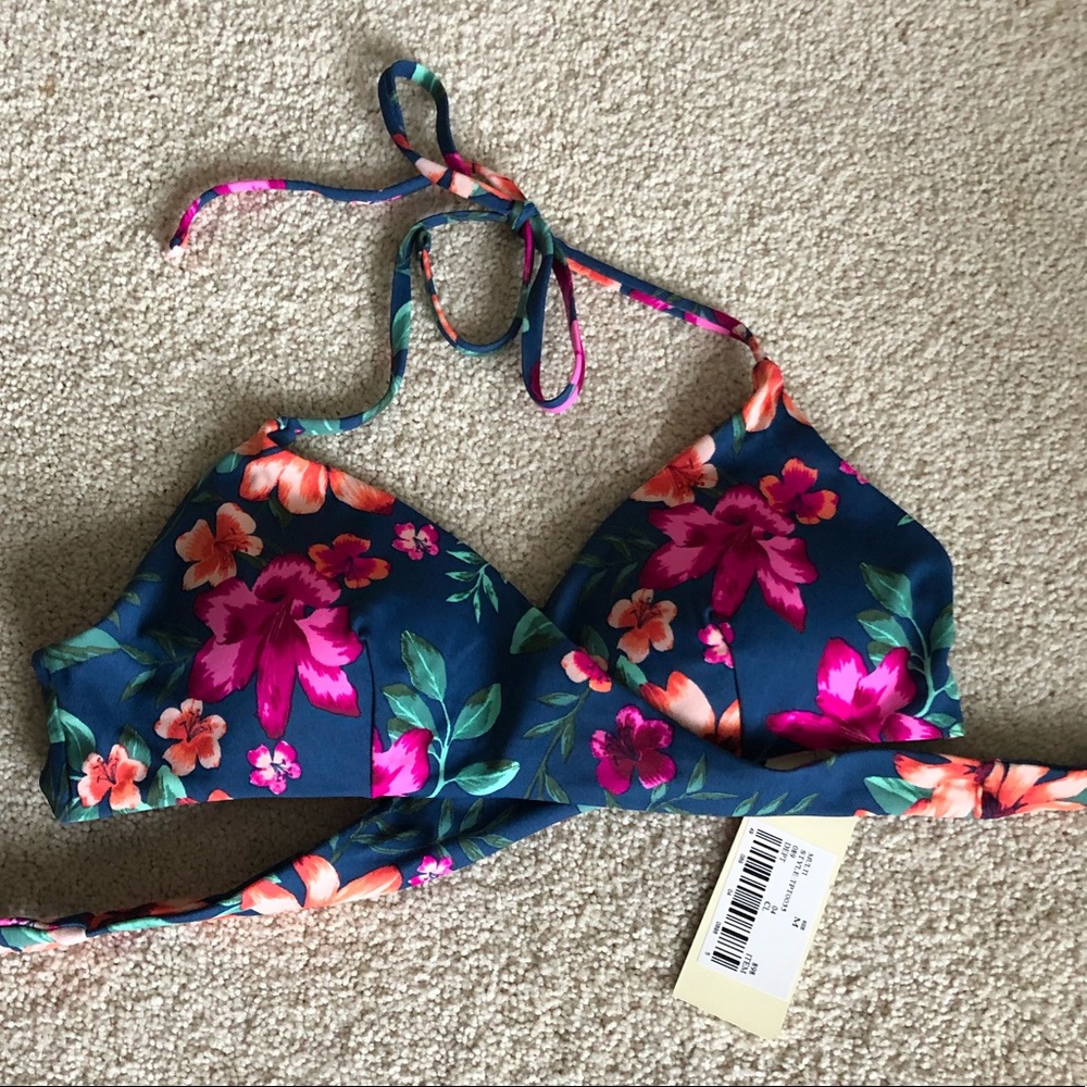 Brand new wrap around bikini top. Size M. NWT